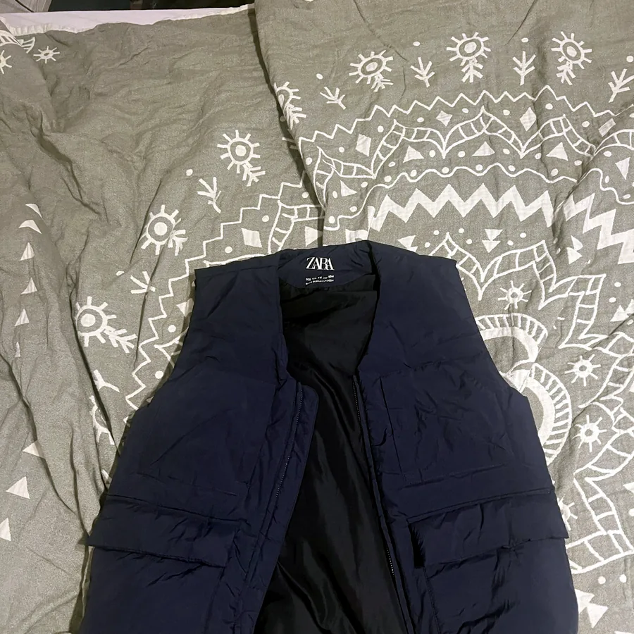 Жилетки Zara