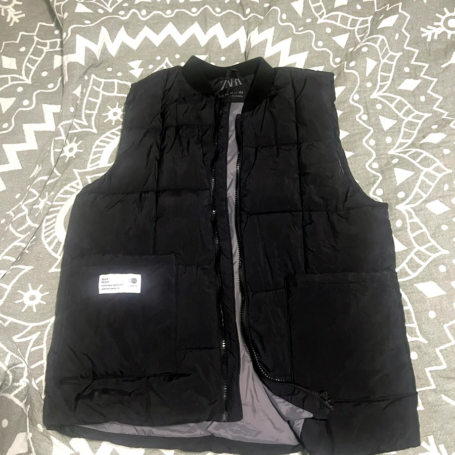 Жилетки Zara