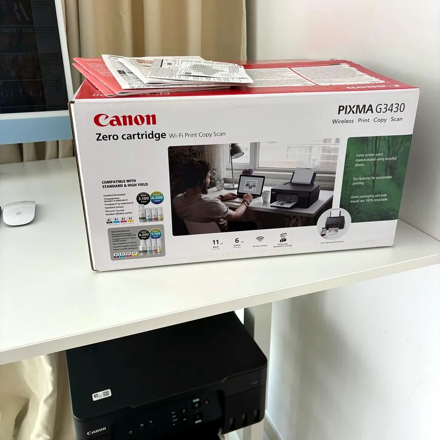 Рабочее место: iMac 24 M3, принтер Canon, стол